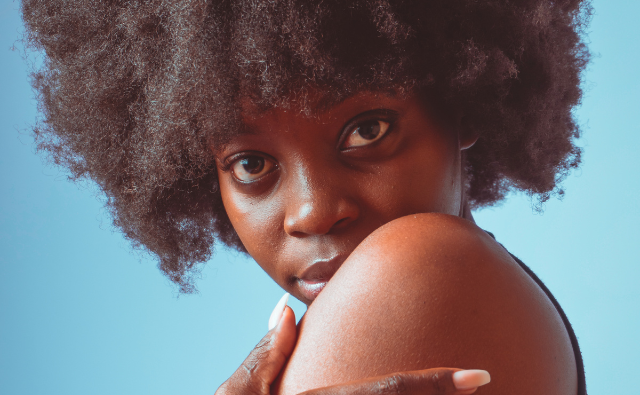 Black woman wearing her natural hair