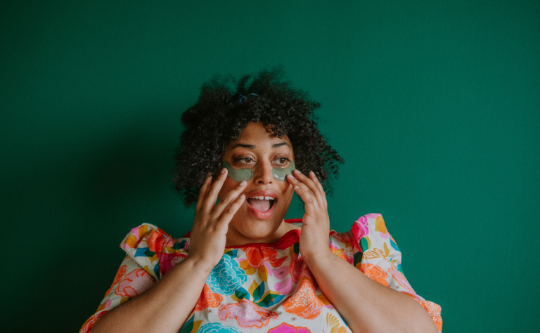 black girl wearing under eye masks