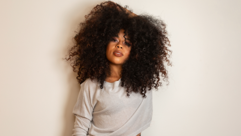 Black girl with long curly hair