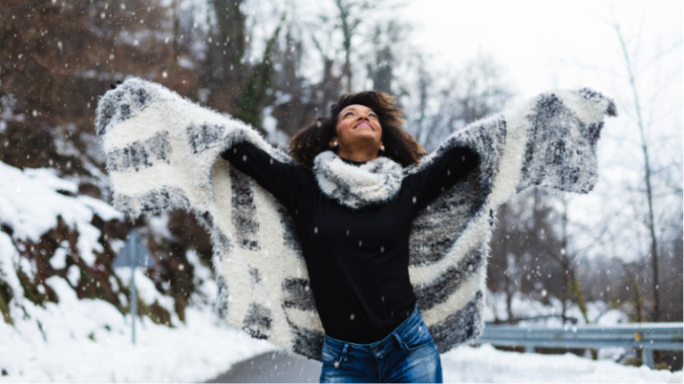 Black girl playing in the snow
